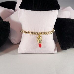 Red, Black, and Gold Beaded Bracelet by Natalie Queen Creations